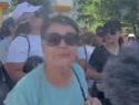 Женщина, плюнувшая в журналистку TV8 на митинге, понесет наказание