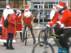Благотворительная кампания в Молдове - Дедов Морозов сажают на велосипеды