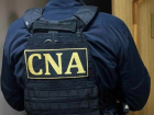 Обыски у двух чиновников и бизнесменов: CNA расследует дело о коррупции