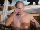 Смелое купание Путина в крещенской проруби сняли на видео