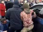 Самосуд киевлян над блокировавшим проезд трамвая водителем BMW попал на видео