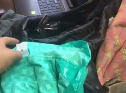 Секретный магазин контрафактных одежды и  обуви в подвале кишиневского дома показали на видео