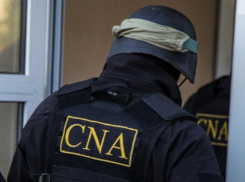 За взятку в 400 леев водителя автобуса осудили на 100 000 леев штрафа и условный срок лишения свободы