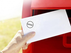 Санду подписала закон о голосовании диаспоры почтой