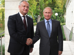 Додон: Путин войдет в историю как миротворец
