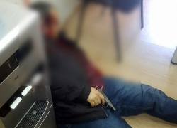 Смертельный выстрел в голову совершил мужчина в офисе кредитной компании из-за долга в 13 000 долларов