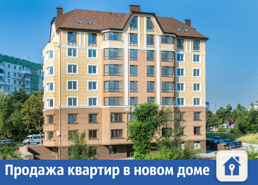 Новый малоквартирный дом из красного кирпича  